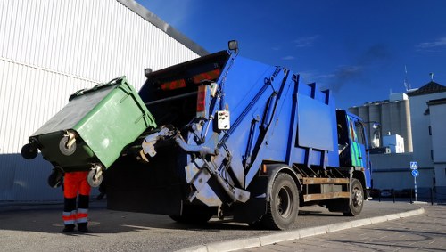 Business professionals managing waste in Peckham office